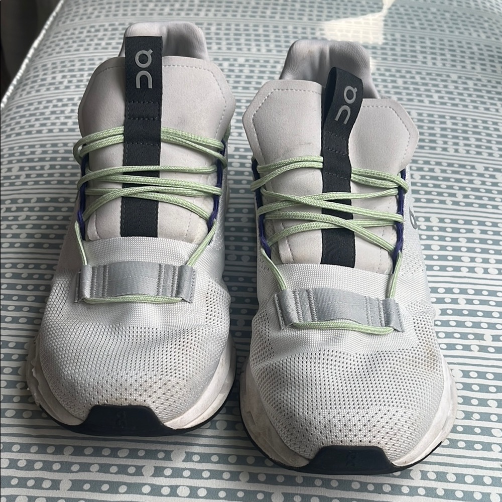 On Running White Shoes with Light Green Laces